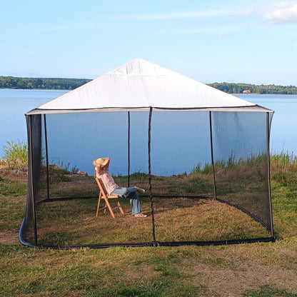 Woman relaxing inside a black 250 × 1650 cm mosquito net installed on a 4 × 4 m square gazebo
