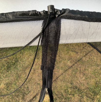 Close-up of a zipper opening above the integrated water-fill tube of the mosquito net 